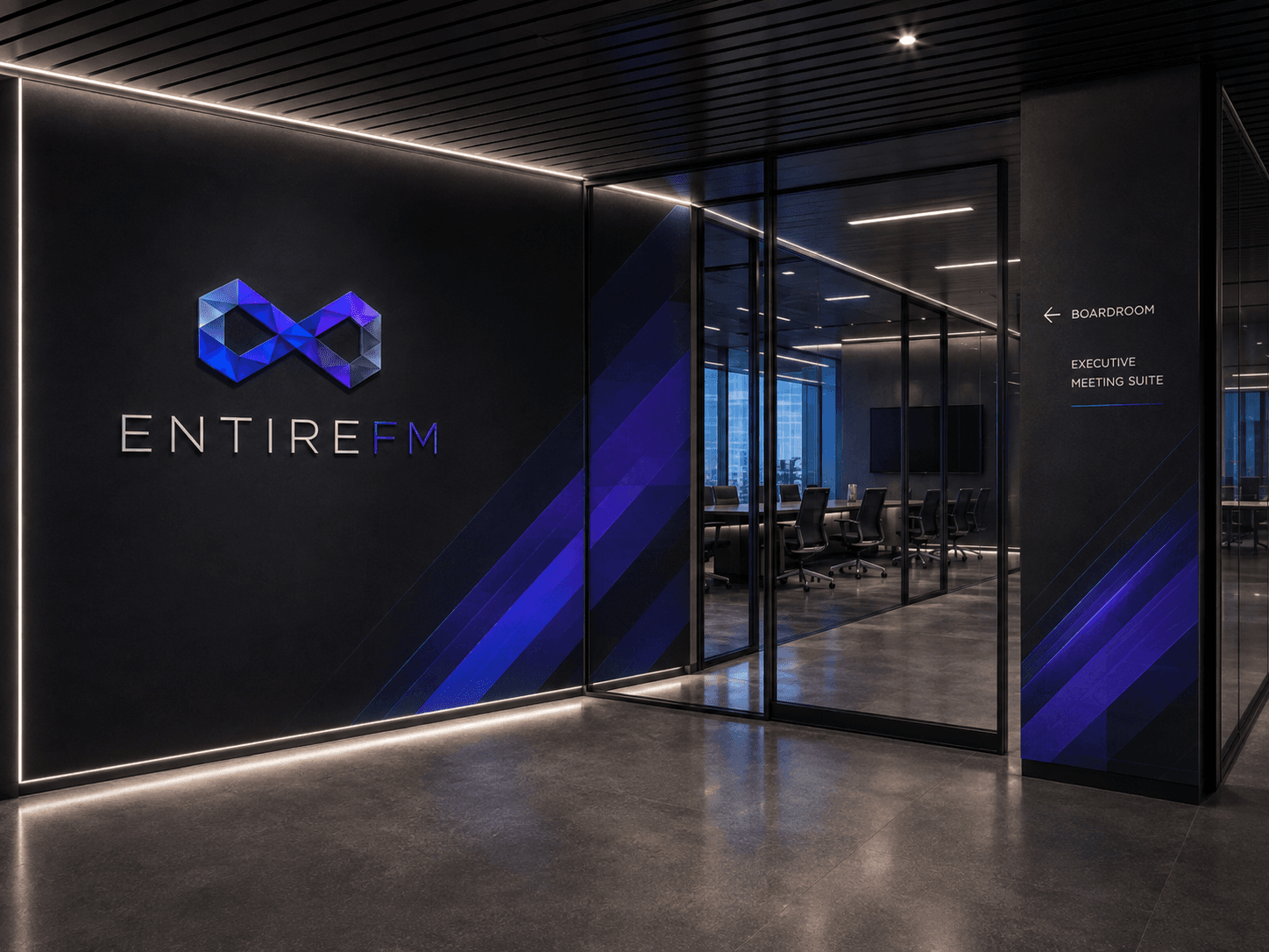 EntireFM corporate headquarters boardroom and executive meeting suite with illuminated 3D faceted brand mark
