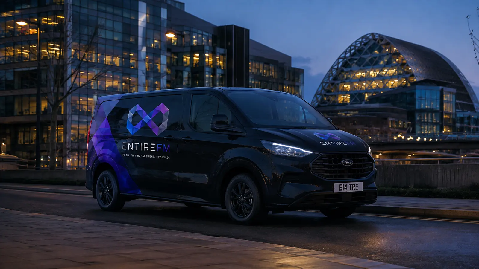 EntireFM facilities management van in Sheffield city centre at dusk